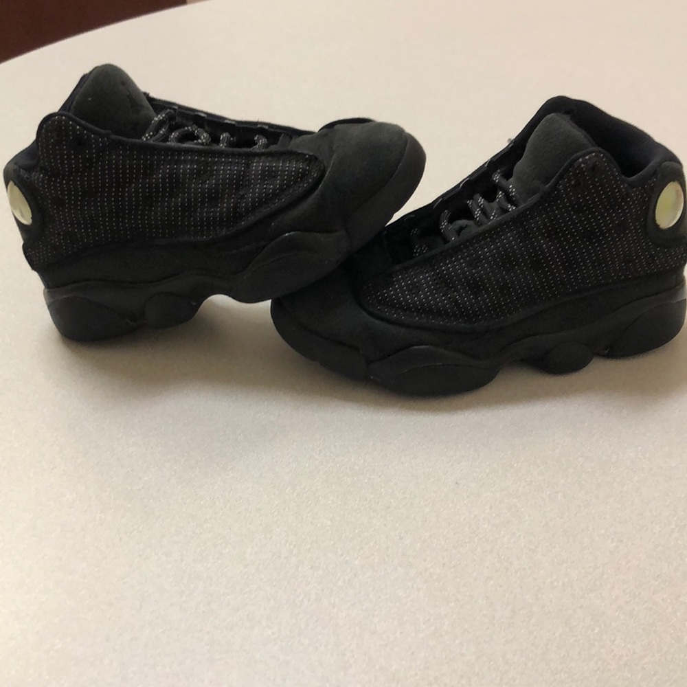 Black Cat Jordan 13s